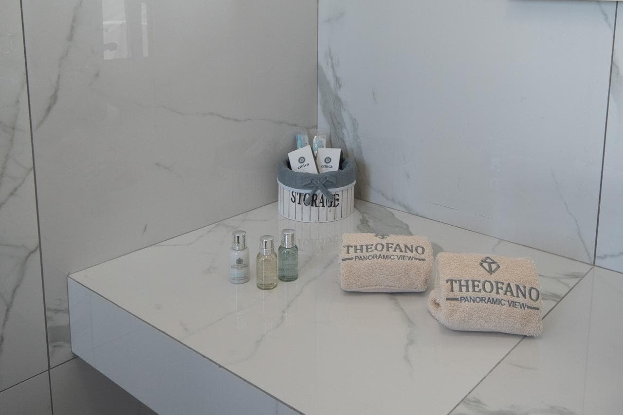 Bath amenities arranged on the marble vanity