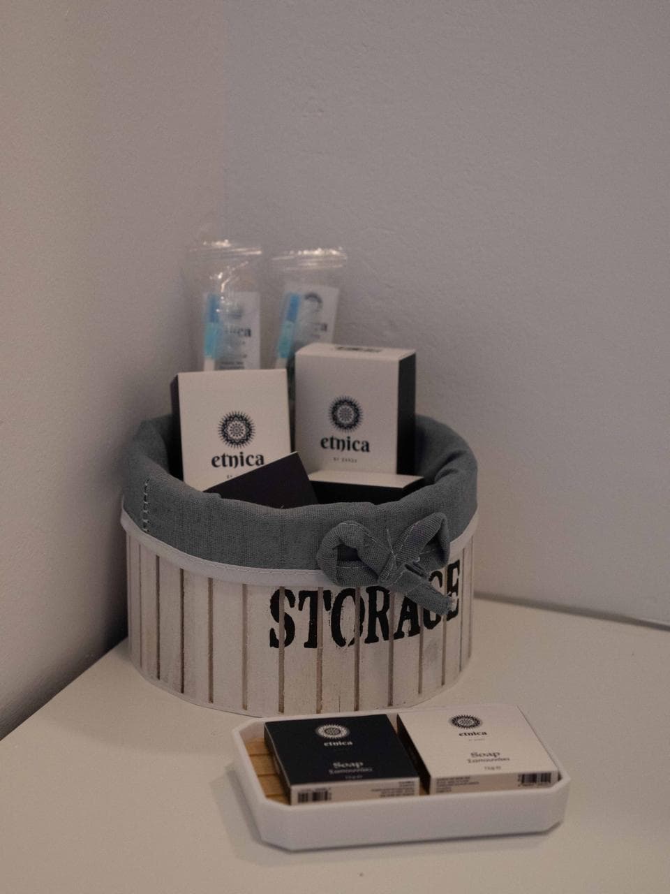 Guest amenity basket with toiletries