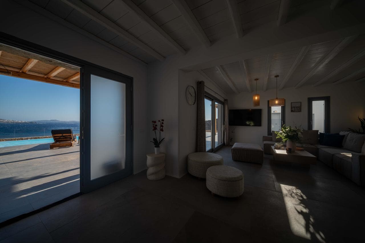 Shaded lounge beside the pool terrace doors