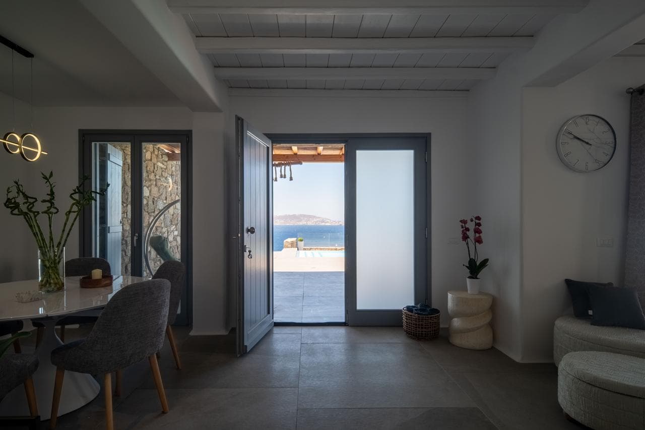 Dining corner with doors opening to the pool terrace