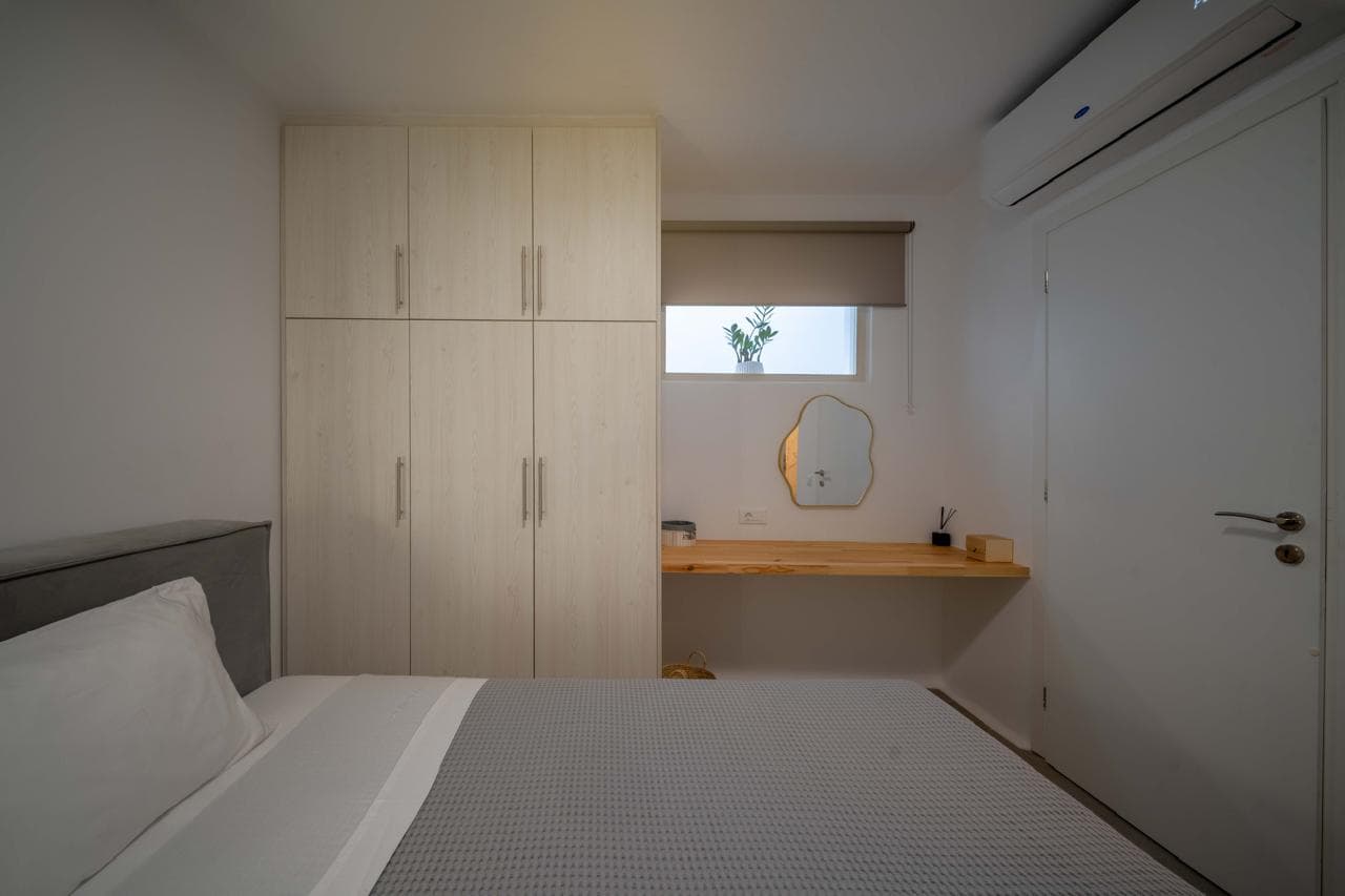 Guest house bedroom with fitted wardrobes