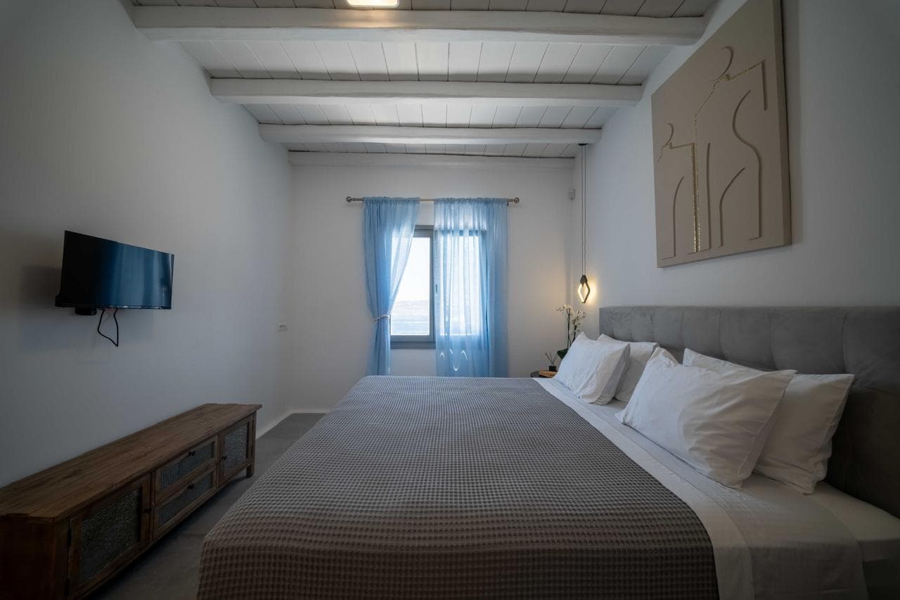 Master bedroom with king bed and soft textiles