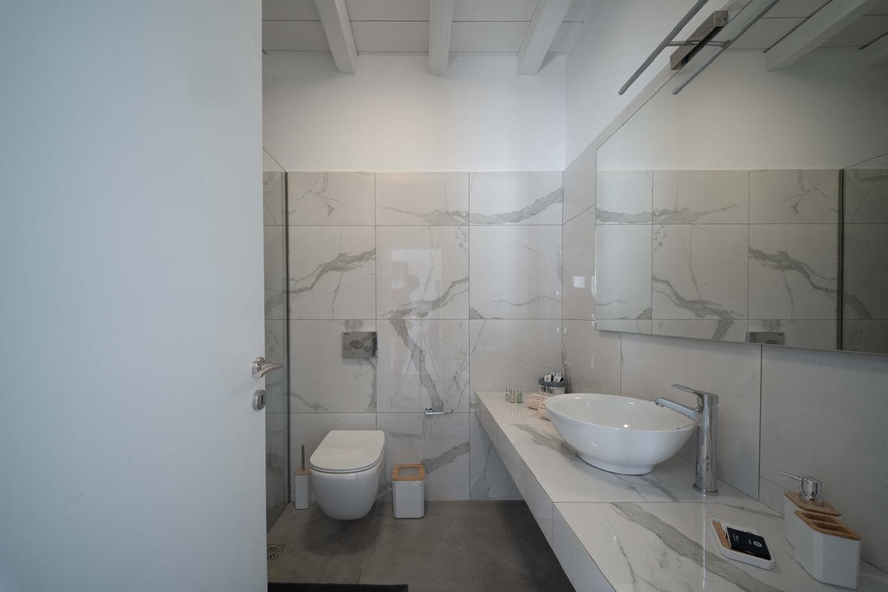 Minimalist bathroom in white marble